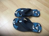 Flip Flops Zehentrenner Adidas Gr. 31 neuwertig Niedersachsen - Schüttorf Vorschau