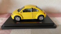 VW Beetle Modell von burago von 1998 Hessen - Oestrich-Winkel Vorschau