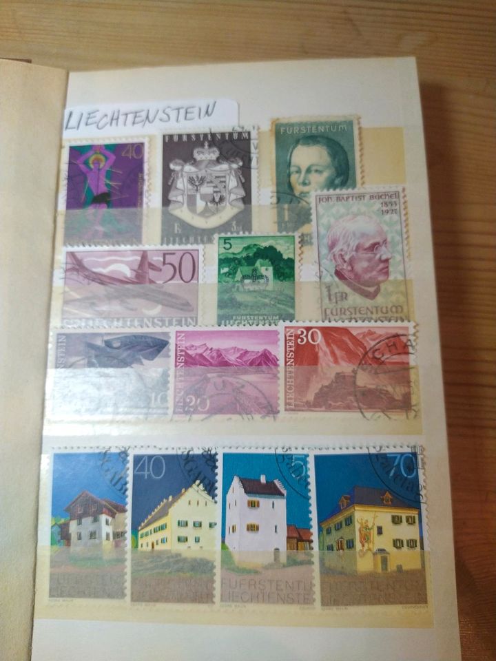 Liechtenstein, Schweiz + Österreich Briefmarken im Album in Lenting