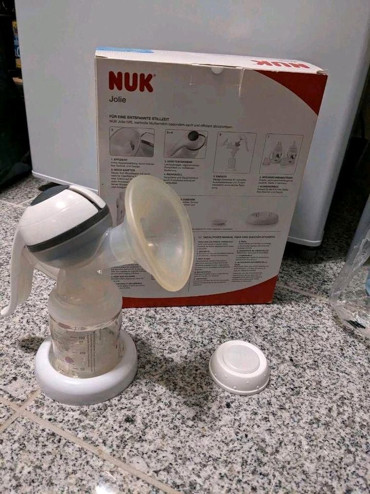 NUK Handmilchpumpe + 11 Muttermilchbeutel in Moers