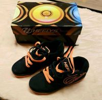 Heelys - Propel 2.0 Schuhe mit Rollen / Fast Neu / Schwarz Orange Sachsen - Beilrode Vorschau