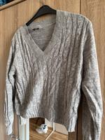 Grauer Pullover Brandenburg - Trebbin Vorschau