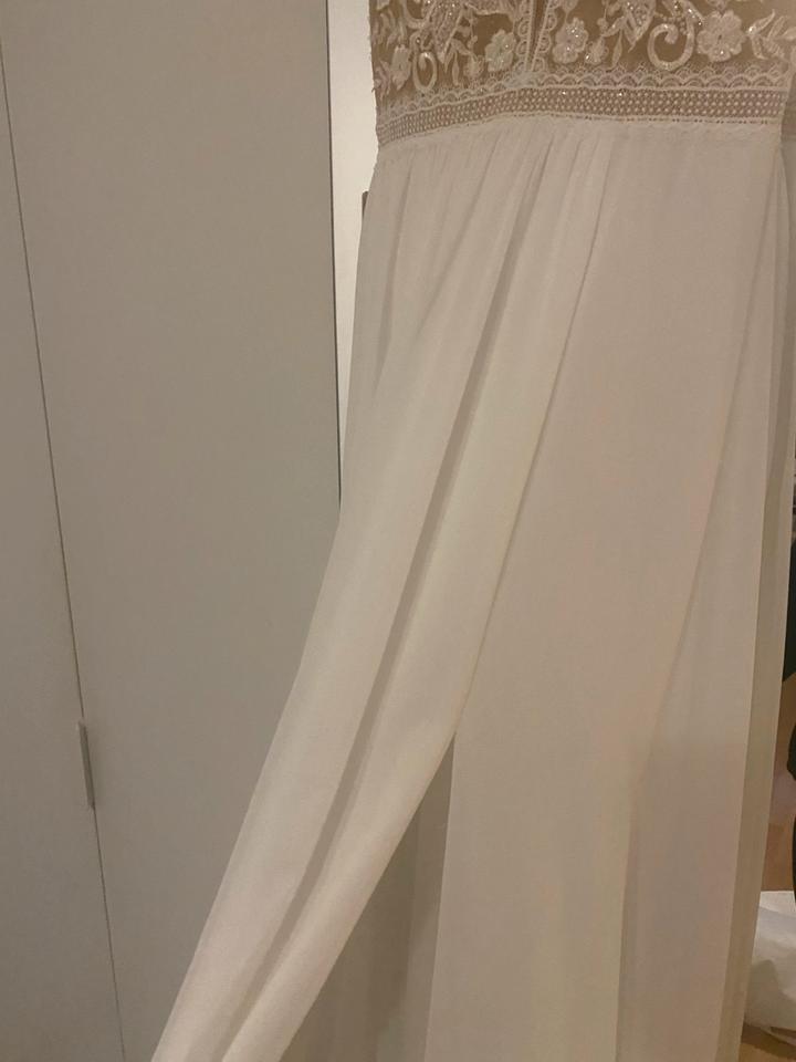 Brautkleid mit Tattoospitze *profesiionelle Reinigung* in München