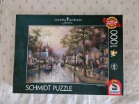 Schmidt Puzzle Thomas Kinkade Morgen in der kleinen Stadt München - Berg-am-Laim Vorschau