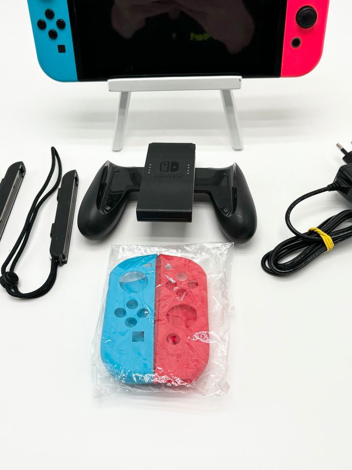 Nintendo Switch Konsole Neon rot/blau inkl. Kabel HAC-001 326B in Filderstadt