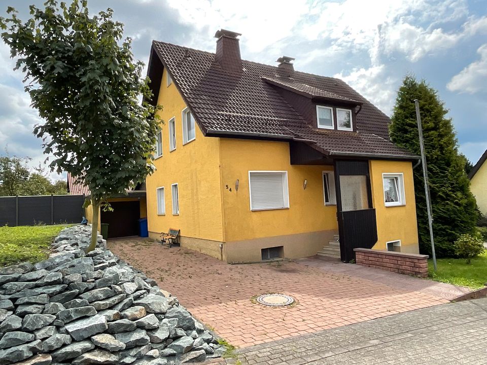 Erdgeschoss Eigentumswohnung 4,5 Zimmer, Garten, Partykeller und
