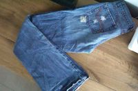 Vintage low waist Jeans used ripped flared Schlaghose XS Loch 36 Niedersachsen - Bückeburg Vorschau