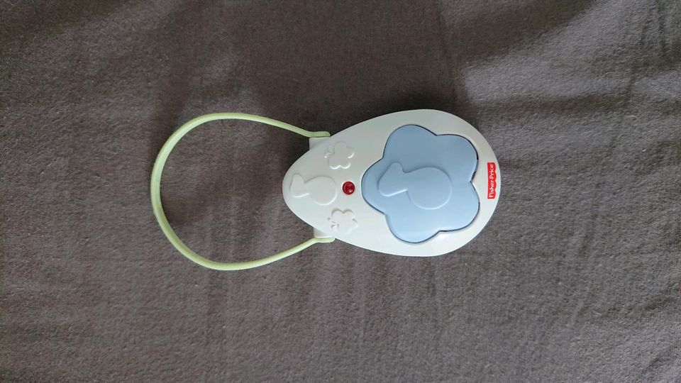 Fisher Price Babybett Spielzeug, Mobile mit Fernbedienung in Linnich