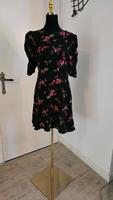 Sexy Kleid Minikleid Blumen schwarz Puffärmel Gr. 42 Niedersachsen - Lilienthal Vorschau