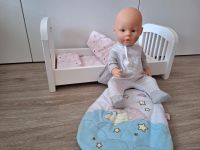 Goki Puppen Bett mit Puppe Schlafsack und Bettwäsche Set Nordrhein-Westfalen - Bedburg Vorschau