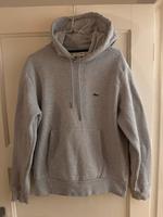 Lacoste Hoodie / Kapuzenpulli / Pullover grau, Größe M/L Hamburg-Nord - Hamburg Eppendorf Vorschau