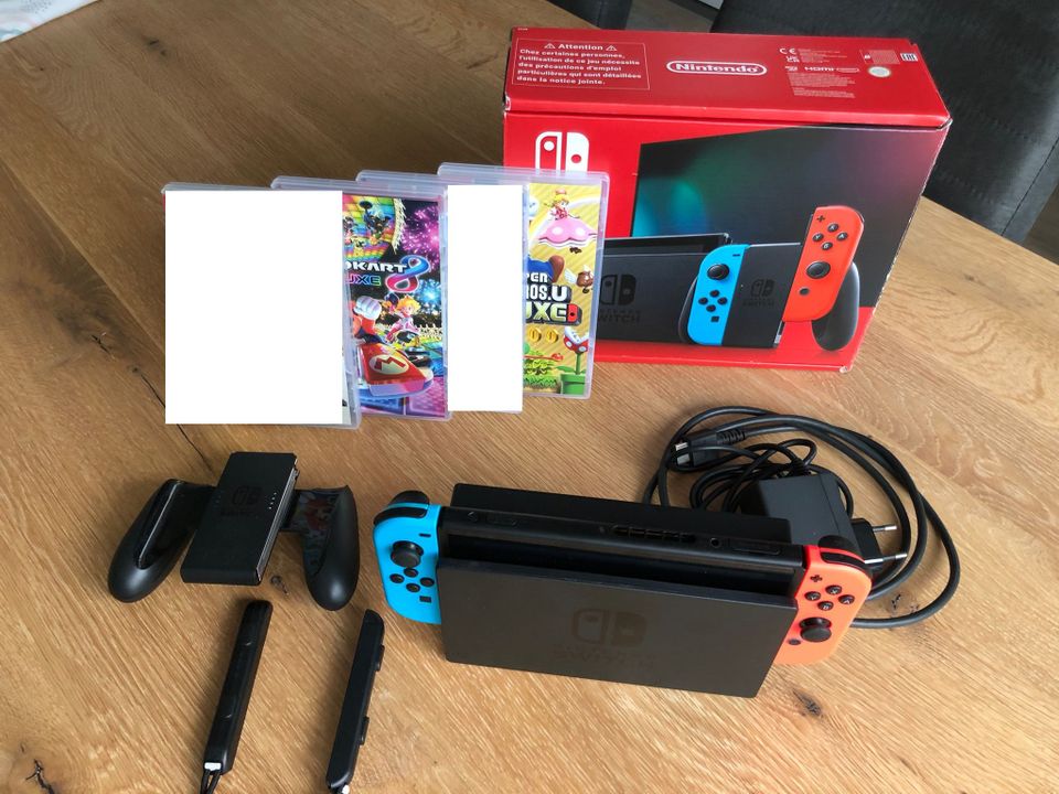 Nintendo Switch mit OVP + 2 Spiele: Mario Kart und Mario Bros. in Obersulm