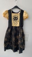 Kleid für Halloween gold schwarz Katze Sterne Spinnenweben Gr 140 Baden-Württemberg - Nürtingen Vorschau