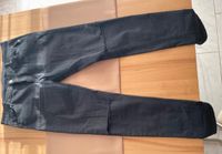 Schwarze Jeans mit Löchern an den Knien Bayern - Wasserlosen Vorschau