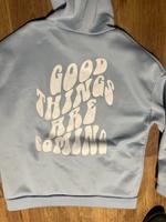 Hoody hellblau mit Print Größe 40/42 Nordrhein-Westfalen - Issum Vorschau