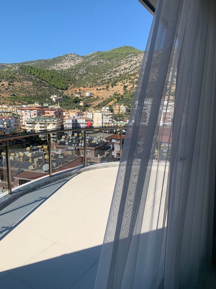 Möblierte 3+1 Duplex-Wohnung an der Spitze von Cleopatra in Alanya: Luxuriöses Wohnen mit spektakulärem Meer- und Bergblick in Rheine