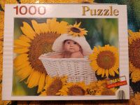 1000 Teile Puzzle Laura Florini Baby mit Sonnenblumen Herzogtum Lauenburg - Köthel Vorschau