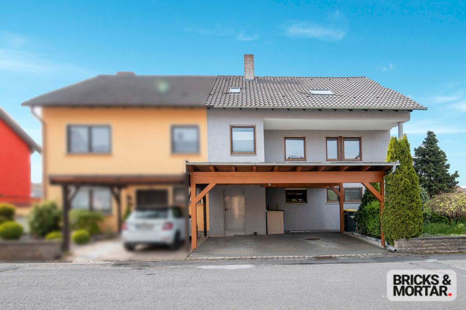 Geräumige Doppelhaushälfte mit schönem Garten und Carport in Kleinrinderfeld