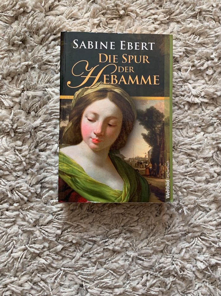 Die Spur der Hebamme - Sabine Ebert Roman Weltbild in Schenefeld (Kreis Steinburg)