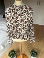 H&M Peplumbluse Bluse mit Volant creme bunt Gr.M neu Hessen - Borken Vorschau