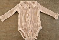 Snug Baby Mädchen Body Langarm KragenTaupe gerippt 68 74 Nordrhein-Westfalen - Erkrath Vorschau