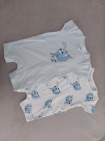 2x kurzer Sommerschlafanzug Größe 68 Faultier blau weiß Babymode Hannover - Döhren-Wülfel Vorschau