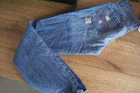 Vintage low waist Jeans used ripped flared Schlaghose XS Loch 36 Niedersachsen - Bückeburg Vorschau