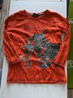 Dragons Langarmshirt Größe 122/128 orange Leipzig - Möckern Vorschau