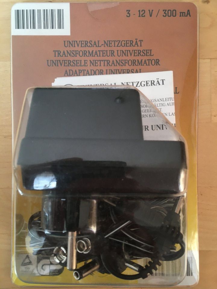 Universal-Netzgeraet 3 - 12V/ 300mA; NEU in OVP in Sigmarszell