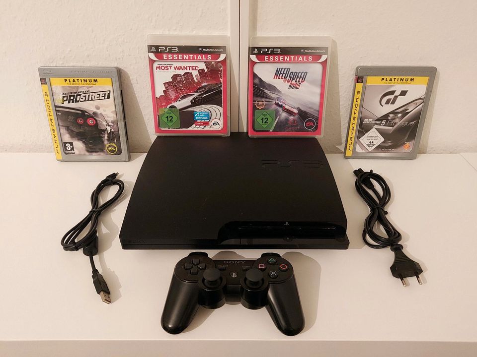 Sony PS3 Slim + 4 Spiele / PlayStation 3 Konsole in Berlin
