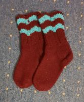 Gestrickte Socken mit hellblauen Wellen Größe 30 Bremen - Vegesack Vorschau