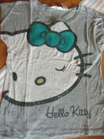 Hello Kitty H&M Kurzarmshirt Gr. 146/152 grau mit Pailetten Nordrhein-Westfalen - Meerbusch Vorschau