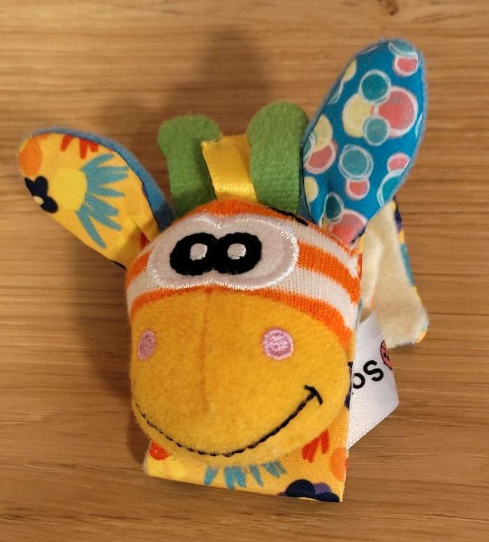 Spielsocken/ -armband für Babys mit Rassel und Knisterohren in Mendig