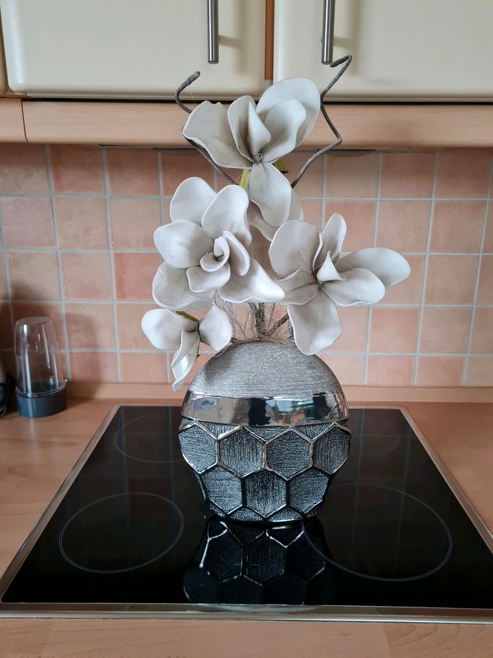 Vase mit Trockenblume in Rustenfelde