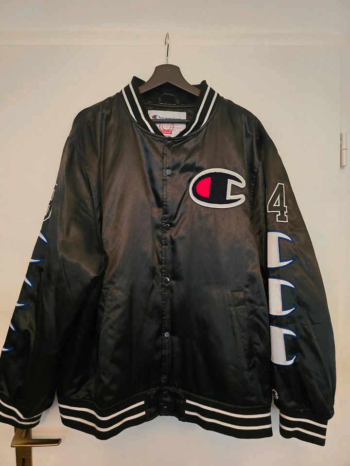 Supreme Champion Hooded Satin Varsity Jacket in Hannover