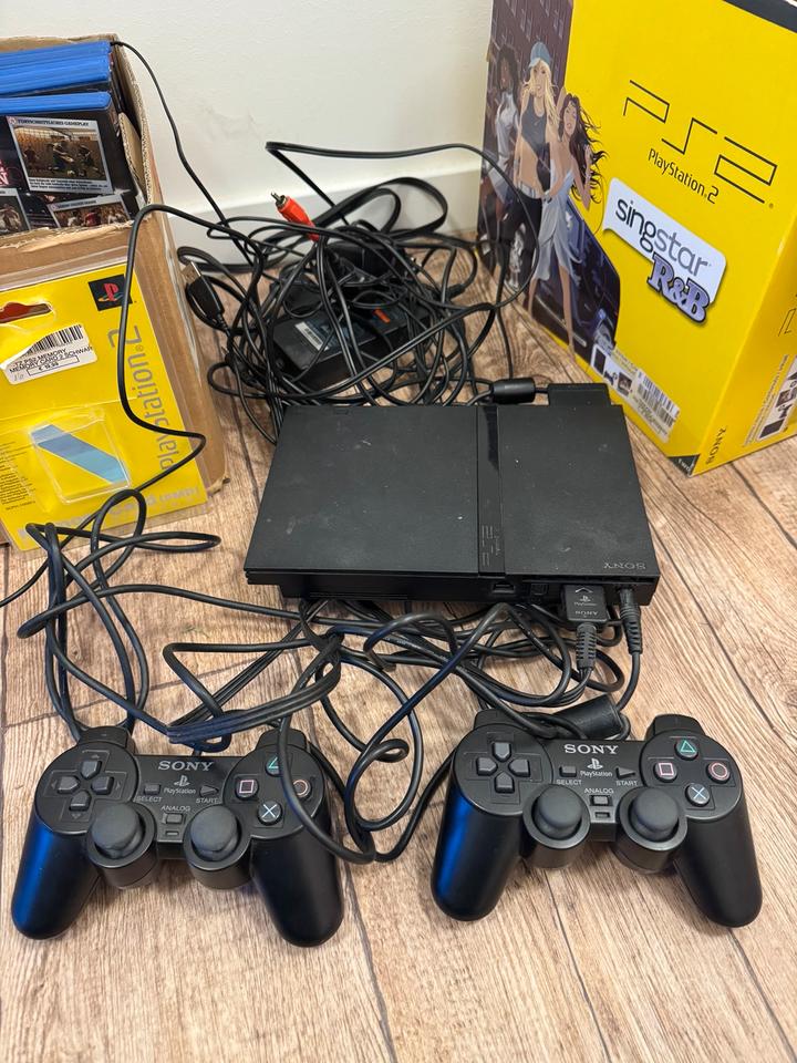 Play Station 2 mit viel Zubehör 19 Spiele Buzz Singstar PS in Limbach-Oberfrohna