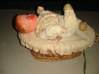 Puppe im Korb strampelt mit Arm und Beinen Baden-Württemberg - Bodman-Ludwigshafen Vorschau