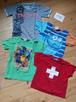 4 Tshirts Gr. 116 (u.a. Superhelden, Schweiz, Fisch Frankfurt am Main - Bornheim Vorschau