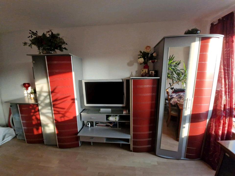 Wohnwand Jugendzimmer rot grau Schrank Kleiderschrank in Köln