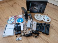 WII mit 5 Spielen und viel Zubehör inkl. Mario. und HDMI Adapter Hessen - Karben Vorschau