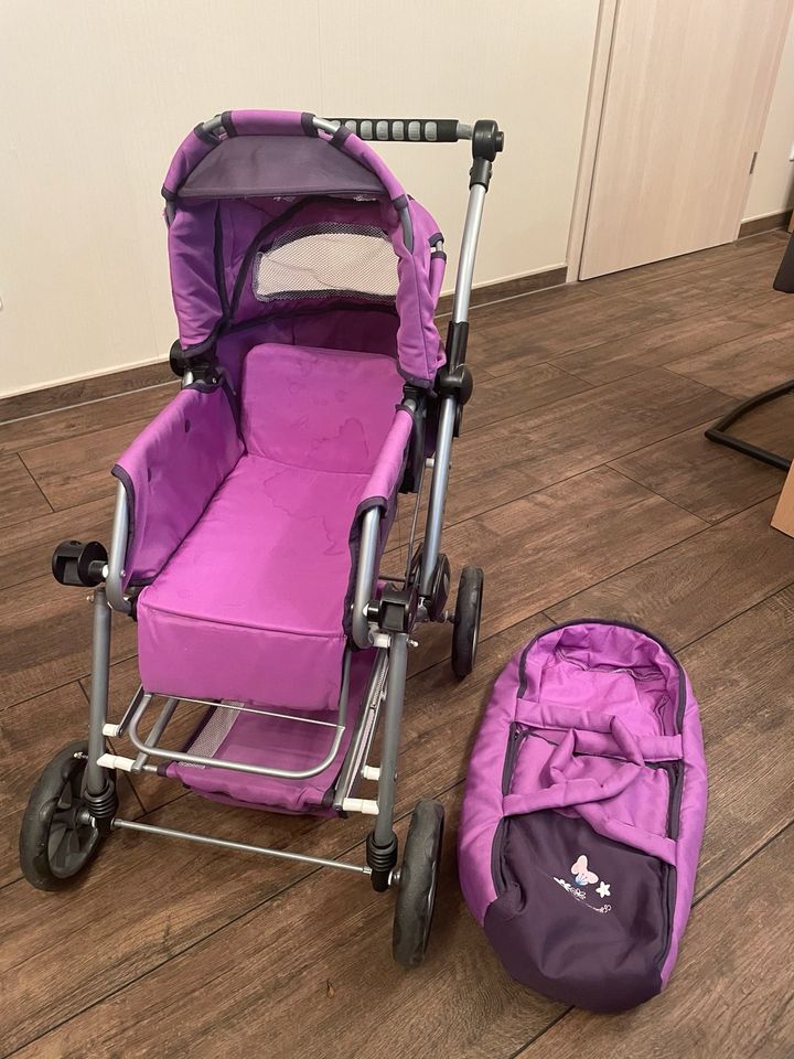 Puppenwagen chic 2000 Kinderwagen lila in Netphen