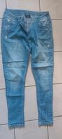 Tolle Jeans mit Glitzersternchen Gr. 42 Niedersachsen - Lüneburg Vorschau
