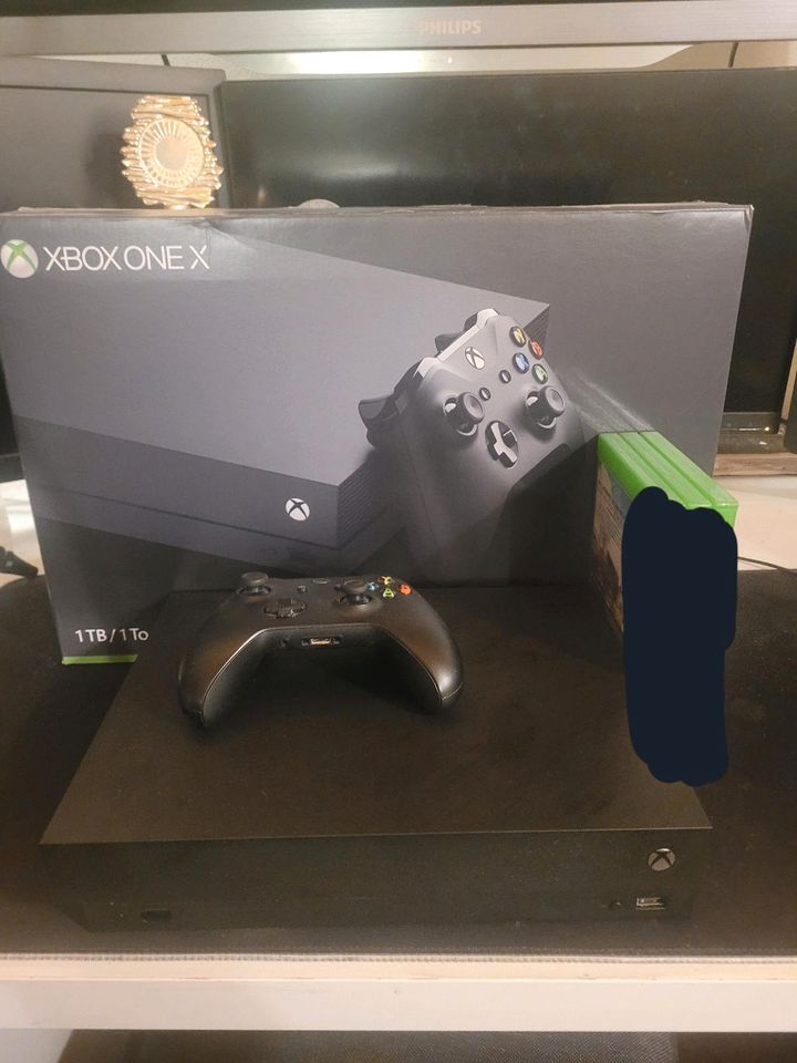 Xbox one x mit 4 spielen und ovp in Minden