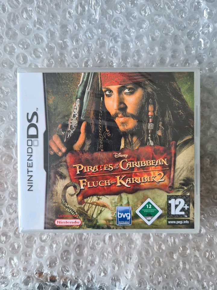 Nintendo Ds Fluch der Karibik 2 (Sealed) in Scharbeutz