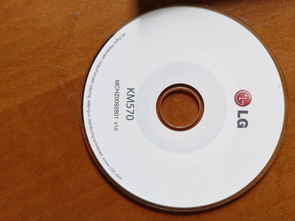 Handy LG KM570 mit Originalkarton und CD in Klein Berßen