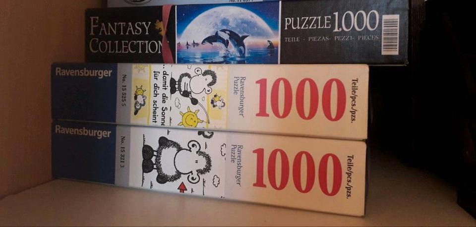 3x 1000 Teile Puzzle; 2x Sheepworld, 1x Leuchtpuzzle in Wülfrath