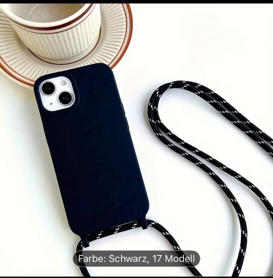 Schwarze Handy Hülle iPhone 15 pro mit Band schwarz weiß neu in Nümbrecht
