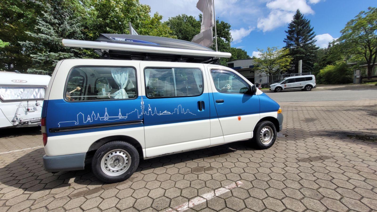 Abbildung des Autos Toyota Hiace - Dein neue…