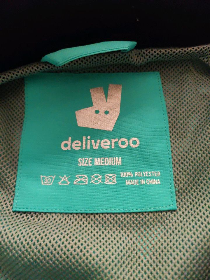 Deliveroo Windbreaker Regenjacke in Bottrop