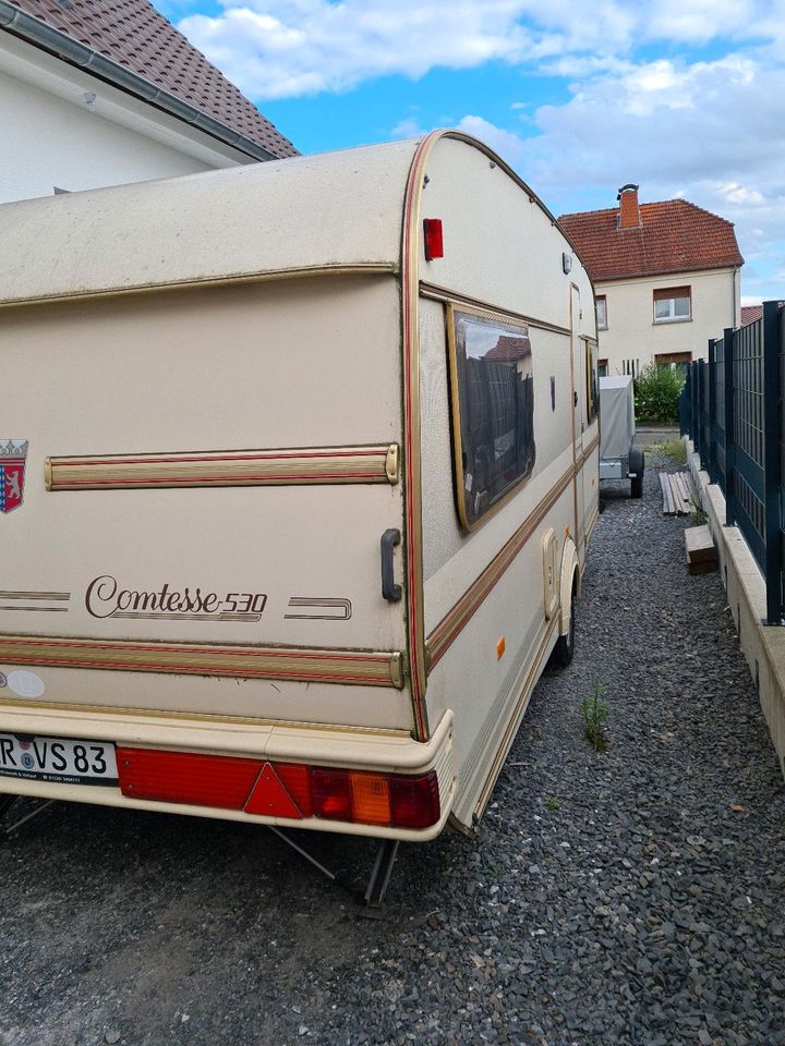 Wohnwagen mit Sonnensegel Verleih Mieten Ferien Camping Anhänger in Neukirchen